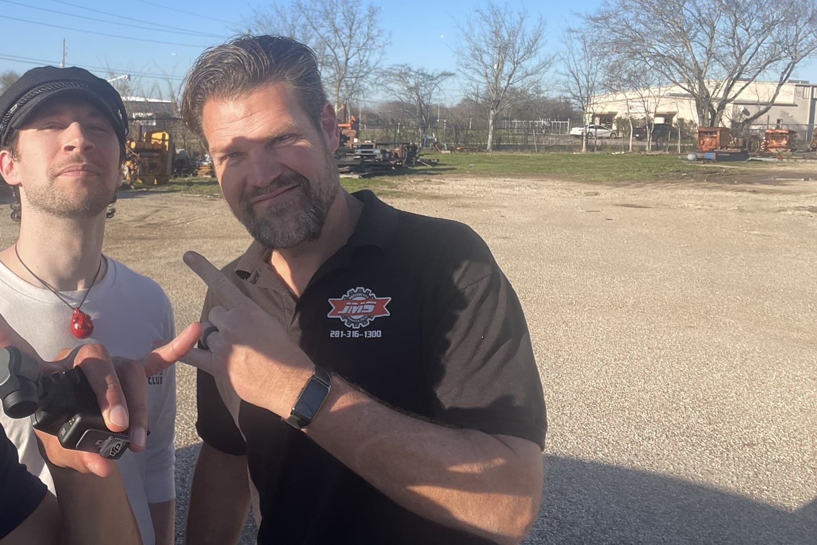 Isaak Hyde with Jim of Jim's Motorcycle Services in Houston, Texas, photographed on location at the shop.